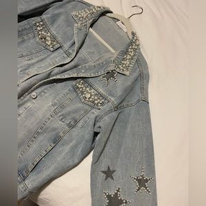 Pearl in rhinestone studded Jean jacket